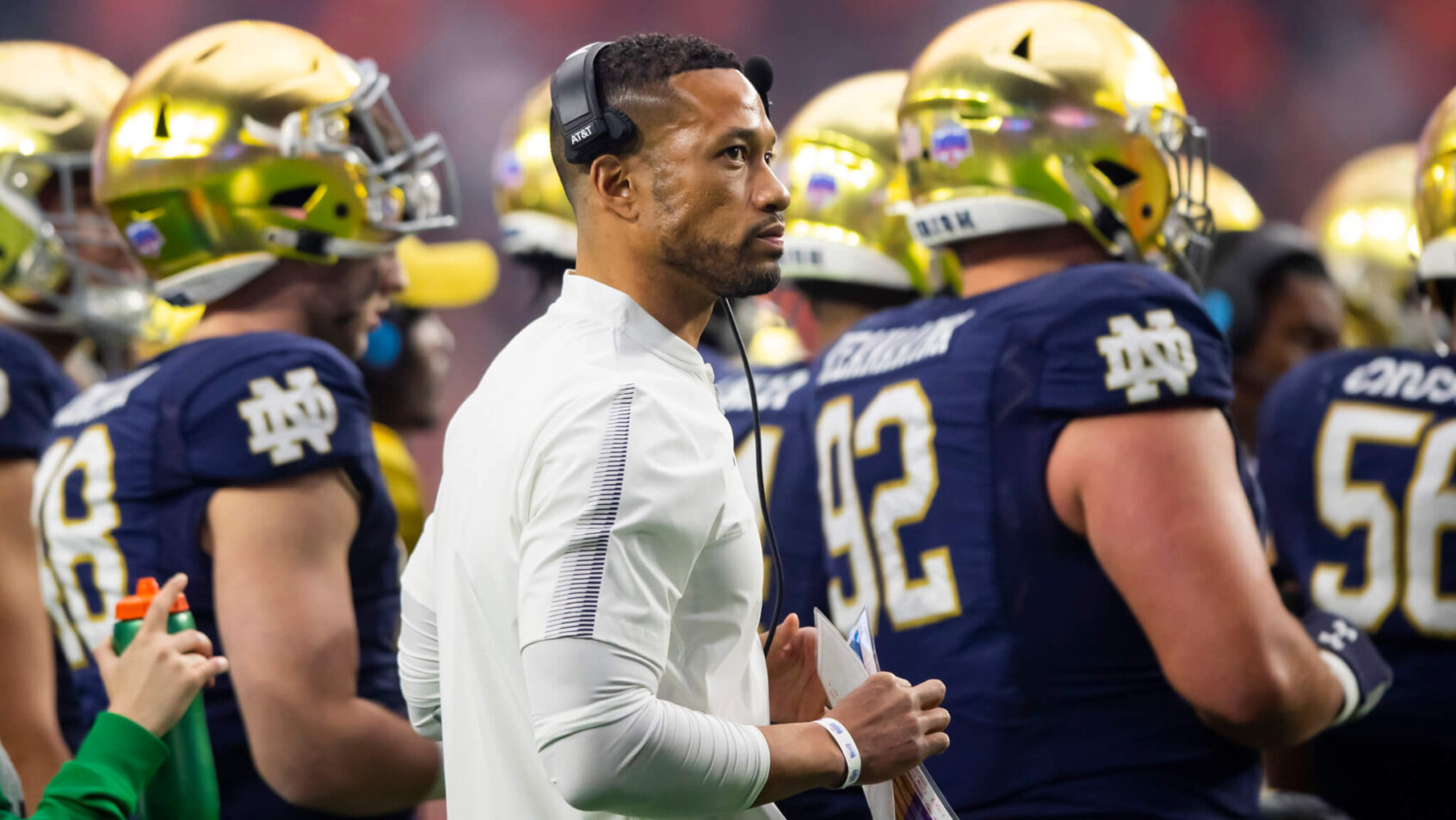 Notre Dame Fighting Irish head coach Marcus Freeman on the field