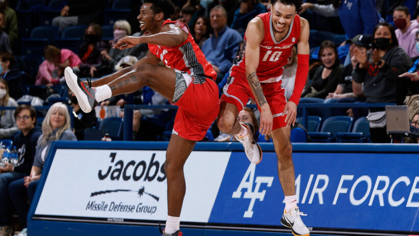 New Mexico Lobos guard Jaelen House celebrates with guard Jamal Mashburn Jr