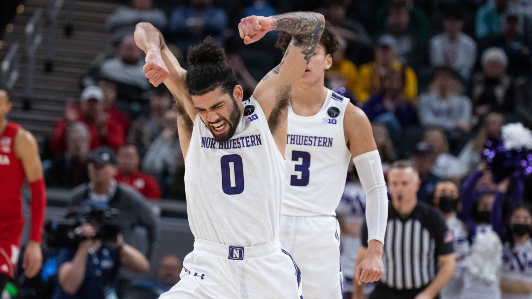 Northwestern Wildcats guard Boo Buie celebrating