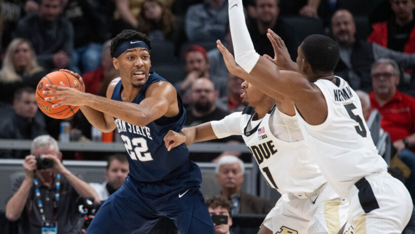 Penn State Nittany Lions guard Jalen Pickett inbounding the ball