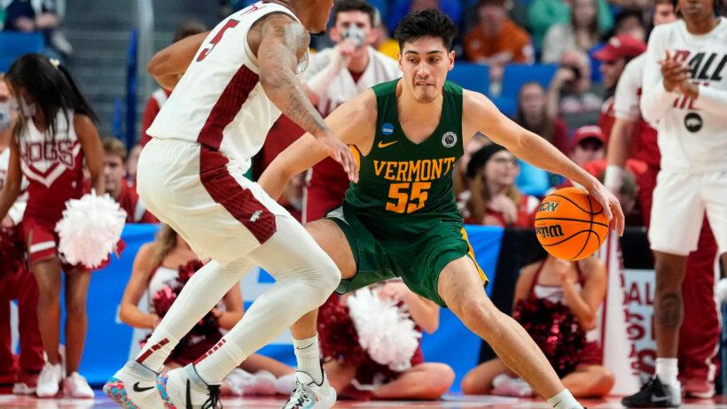 Vermont Catamounts guard Robin Duncan dribbling