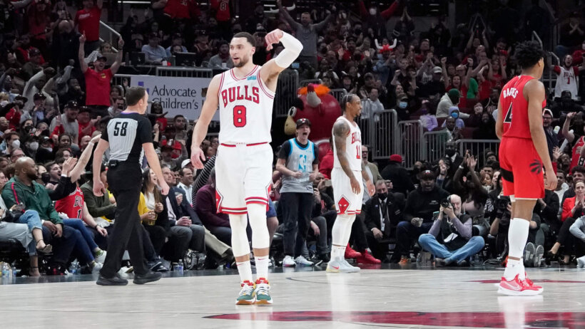 Chicago Bulls guard Zach LaVine celebrates a three