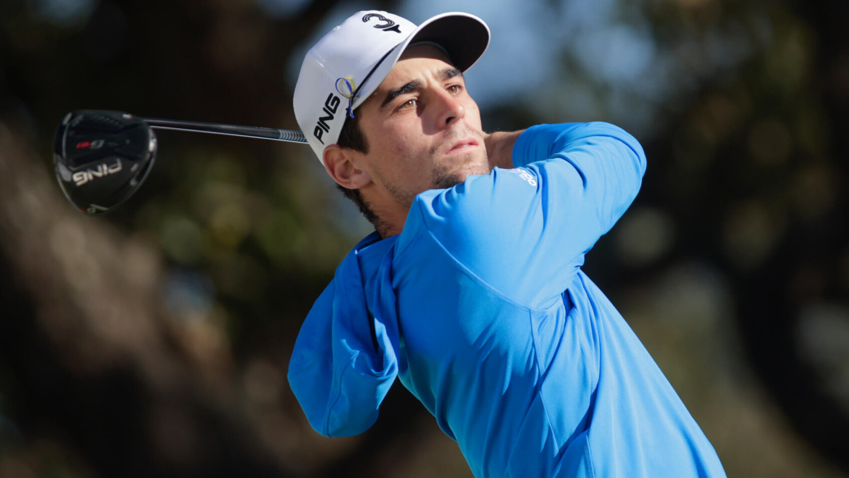 Joaquin Niemann admires a tee shot