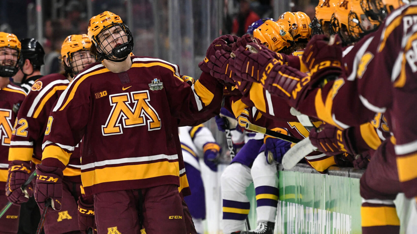 Minnesota Golden Gophers forward Matthew Knies celebrates with teammates after scoring a goal