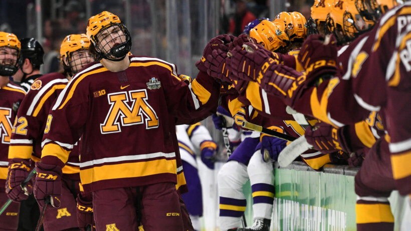 Minnesota Golden Gophers forward Matthew Knies celebrates with teammates after scoring a goal