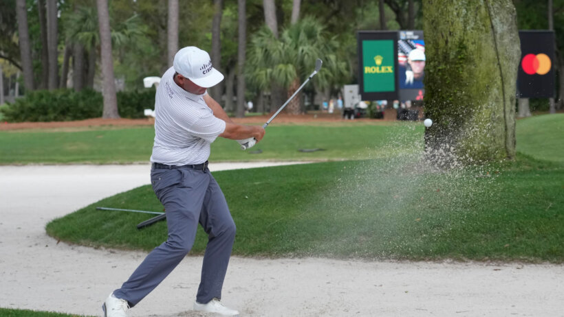 Chez Reavie hits a shot out of a bunker