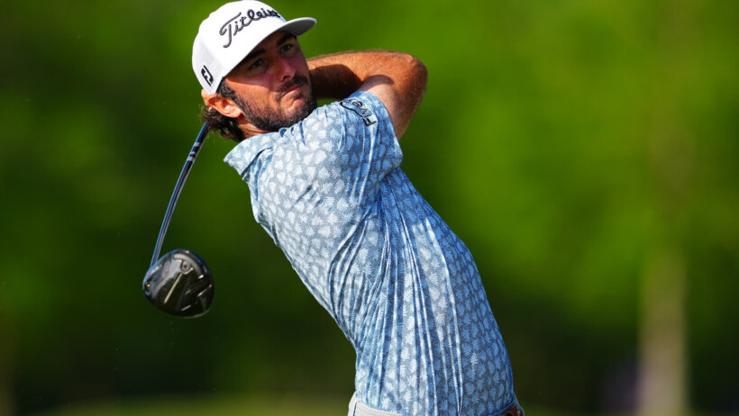 Max Homa admires a tee shot