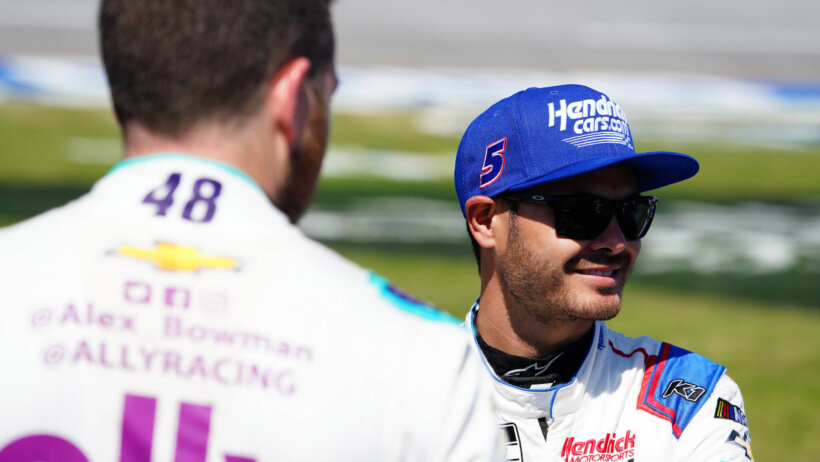 NASCAR Cup Series driver Kyle Larson talking to fellow driver Alex Bowman