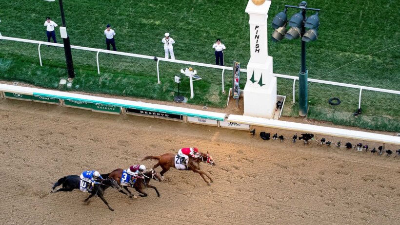 Rich Strike, with Sonny Leon aboard, crosses the finish line ahead of Epicenter and Zandon
