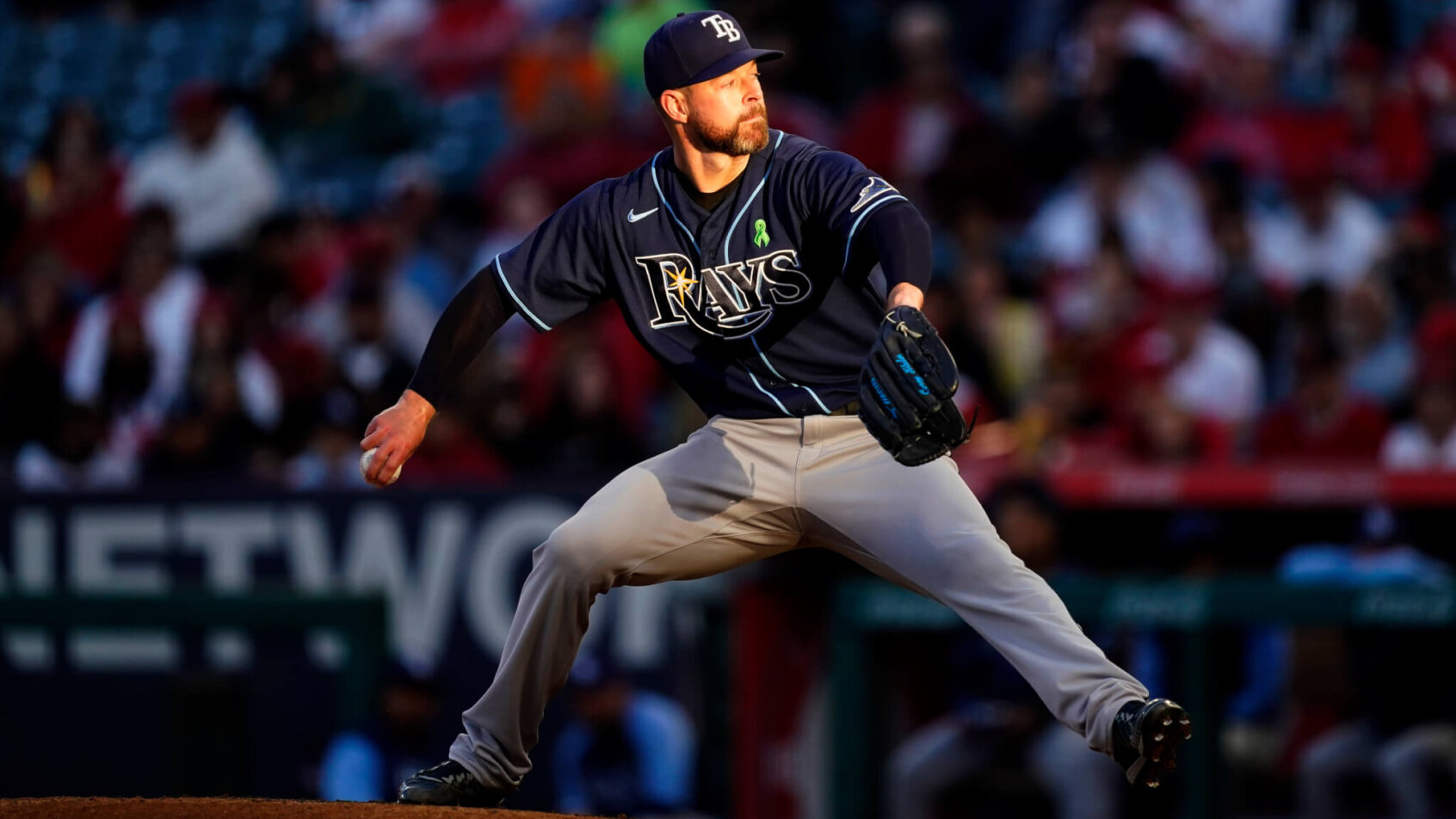 Tampa Bay Rays starting pitcher Corey Kluber mid-windup