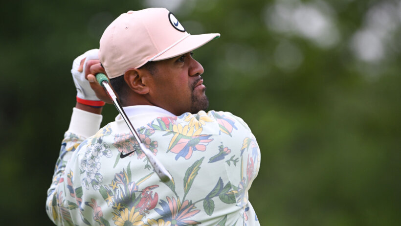 Tony Finau admires an iron shot