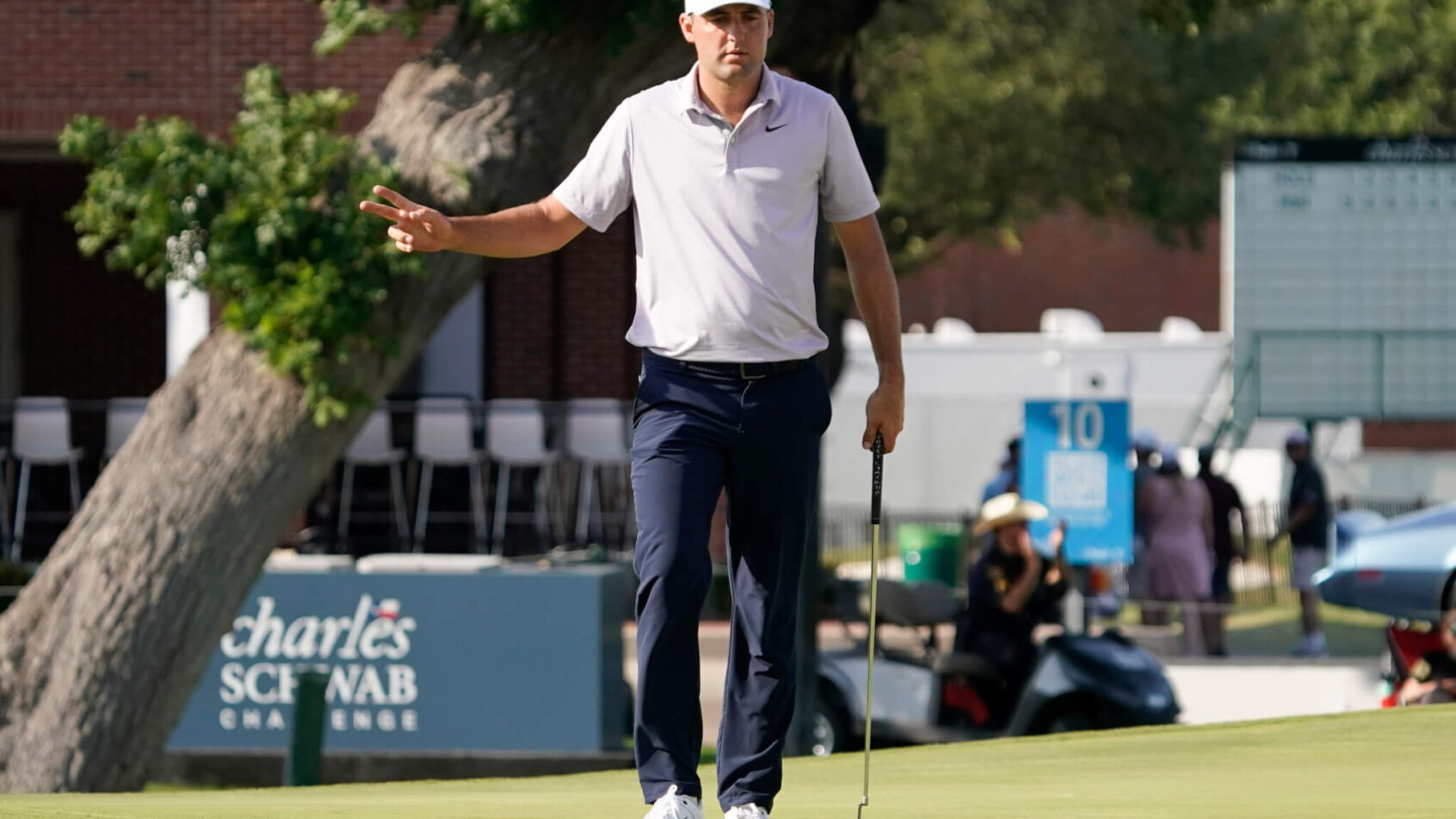 Scottie Scheffler celebrates a birdie