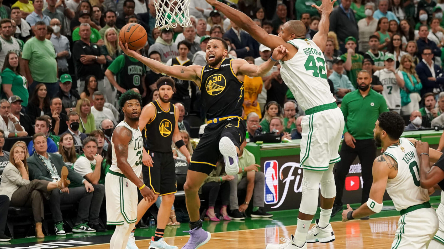 Steph Curry and Al Horford during the NBA FInals.