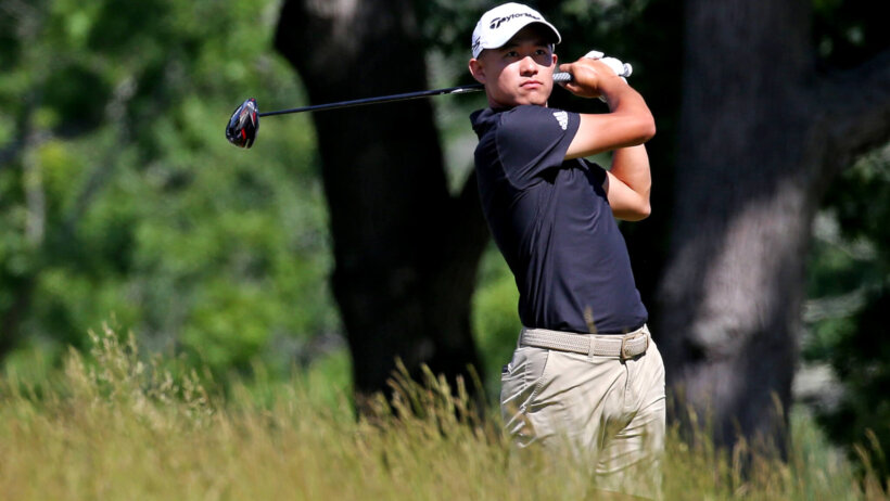 Collin Morikawa watches a tee shot intently