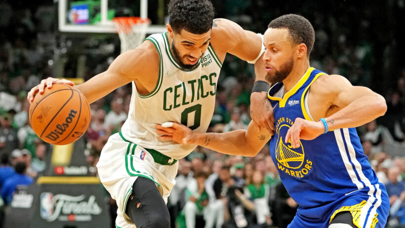 Steph Curry defending Jayson Tatum