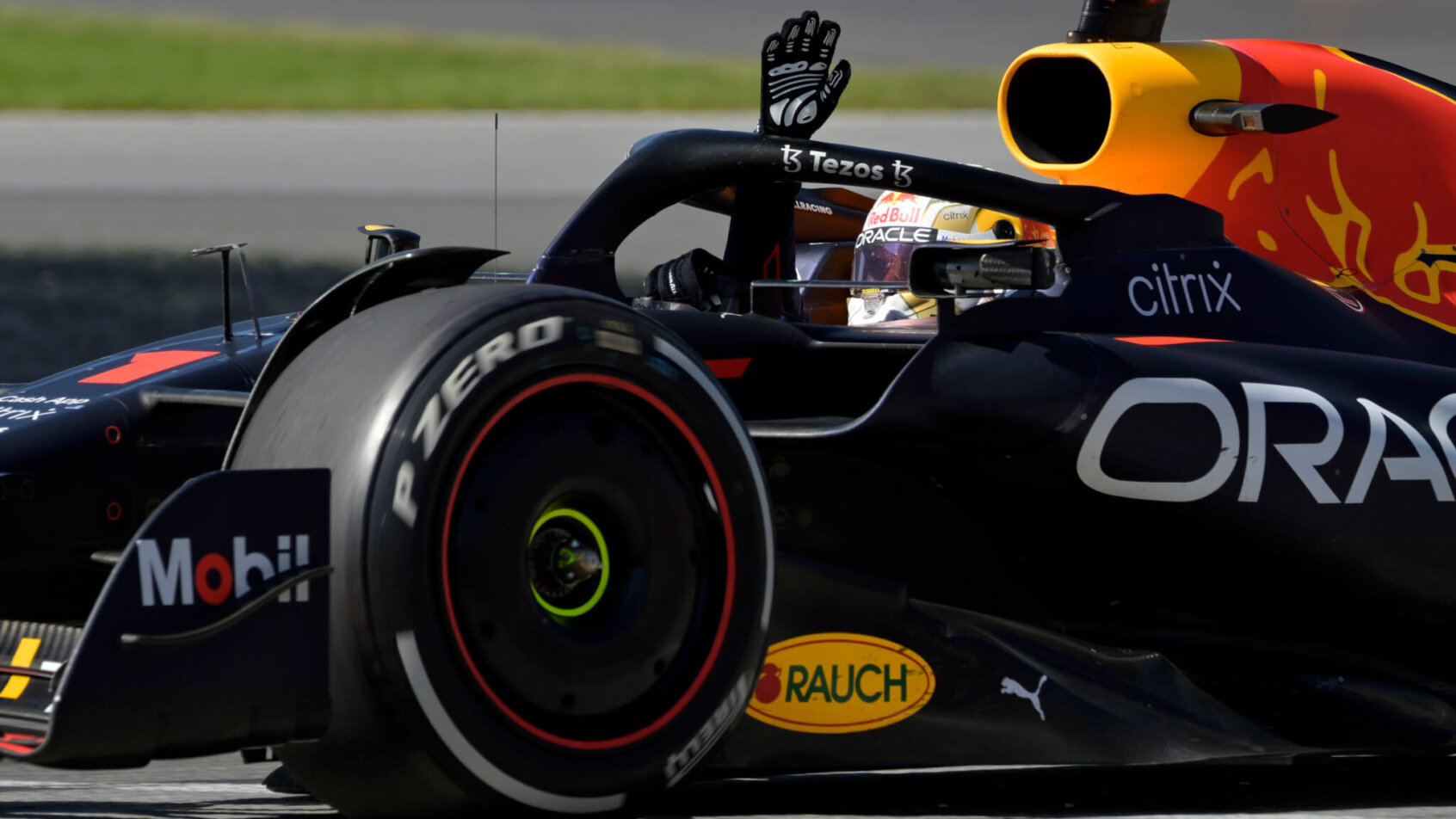 Red Bull Racing driver Max Verstappen waving to the crowd