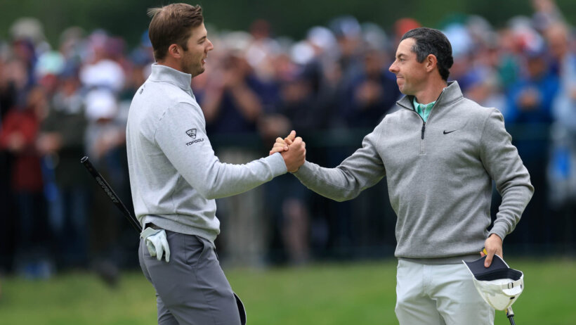 Sam Burns and Rory McIlroy shake hands