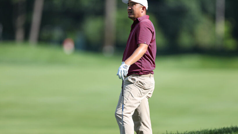 John Huh waiting on the golf course