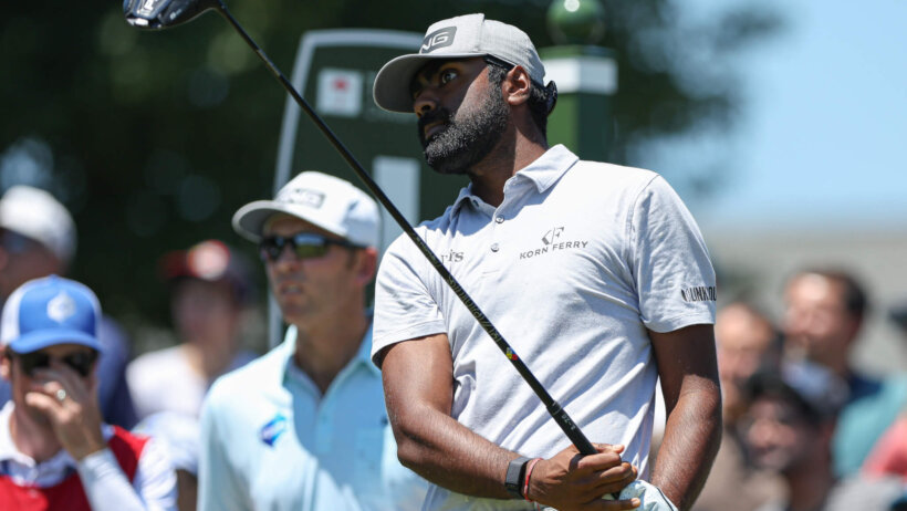 Sahith Theegala watches a tee shot