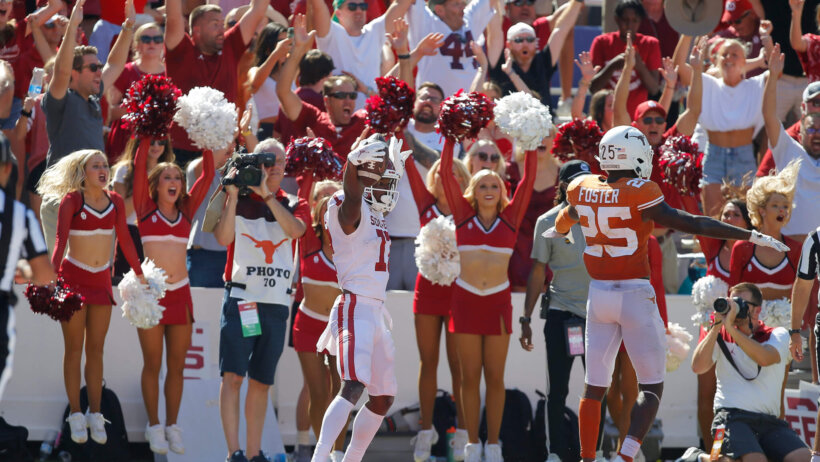 Oklahoma's Marvin Mims celebrating a TD in the 2021 Red River Showdown