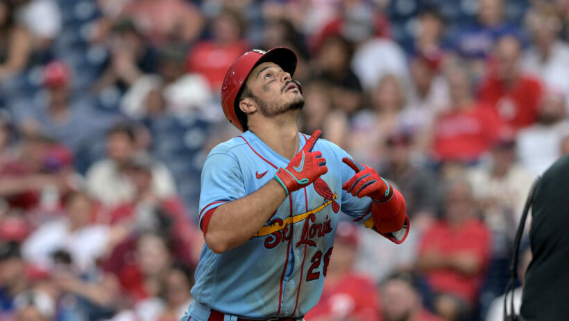 Nolan Arenado reacts after hitting a home run