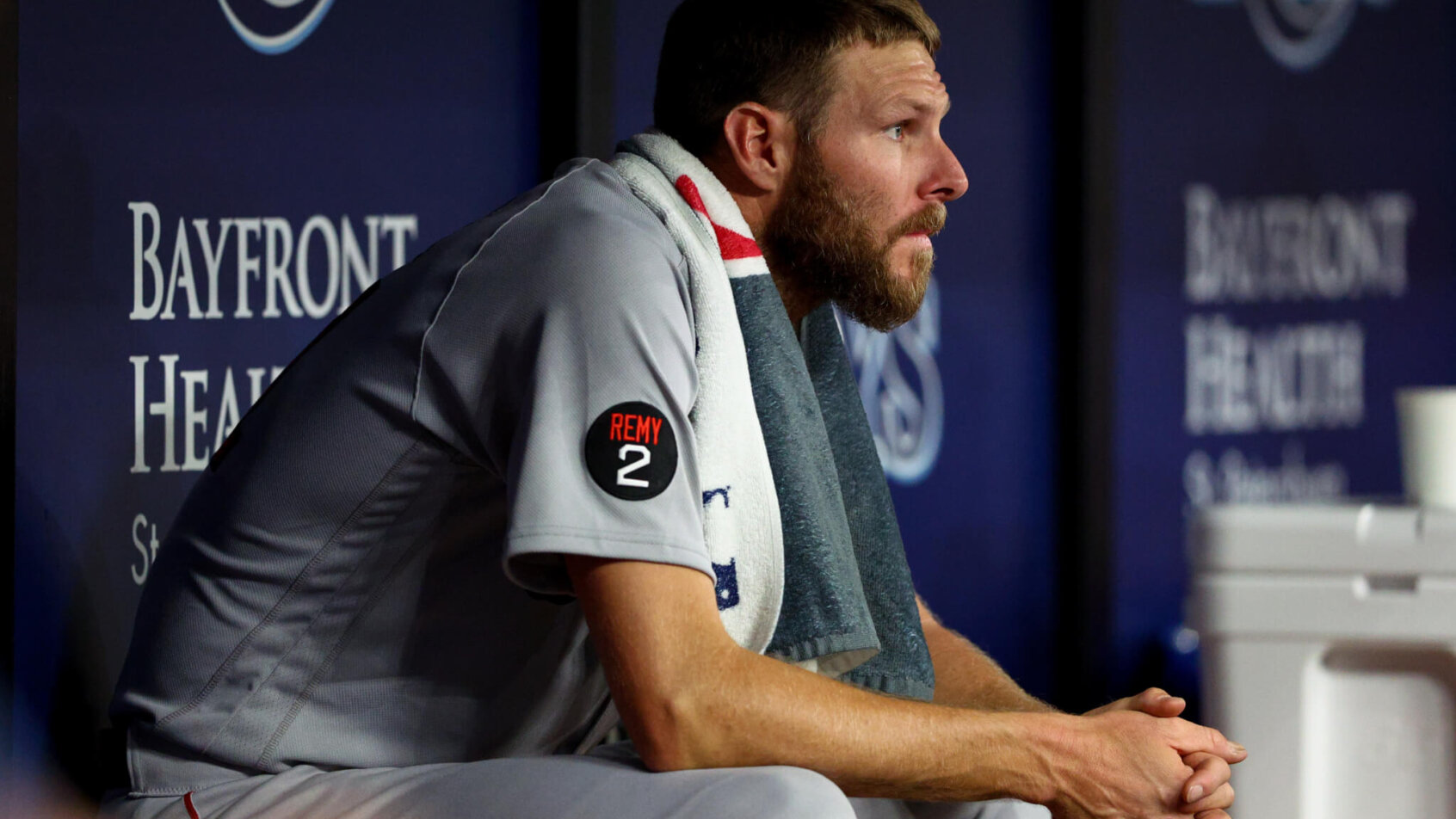 Chris Sale looks on from the bench