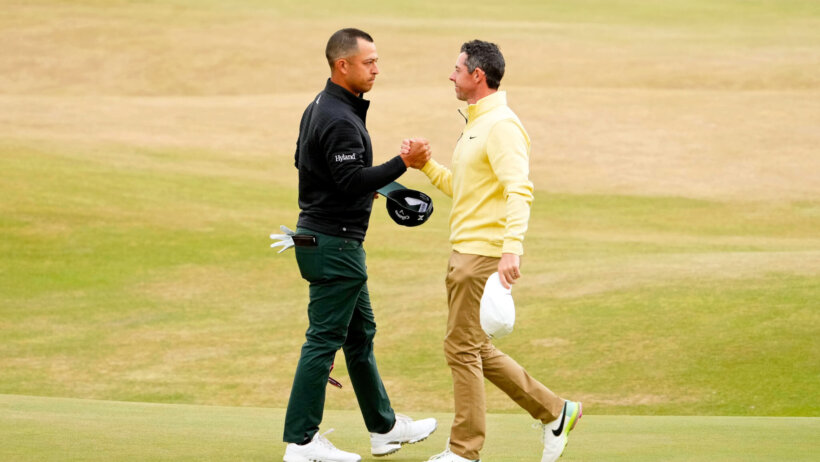Xander Schauffele and Rory McIlroy shaking hands