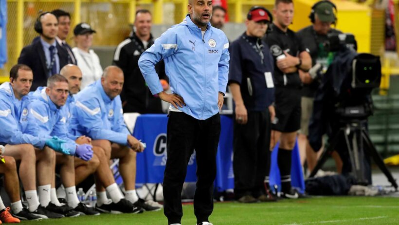 Manchester City manager Pep Guardiola on his team's sideline