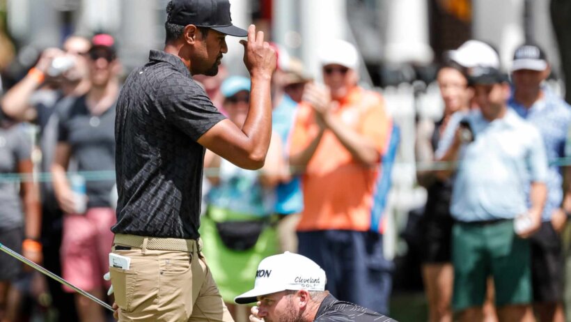 Tony Finau celebrates a birdie