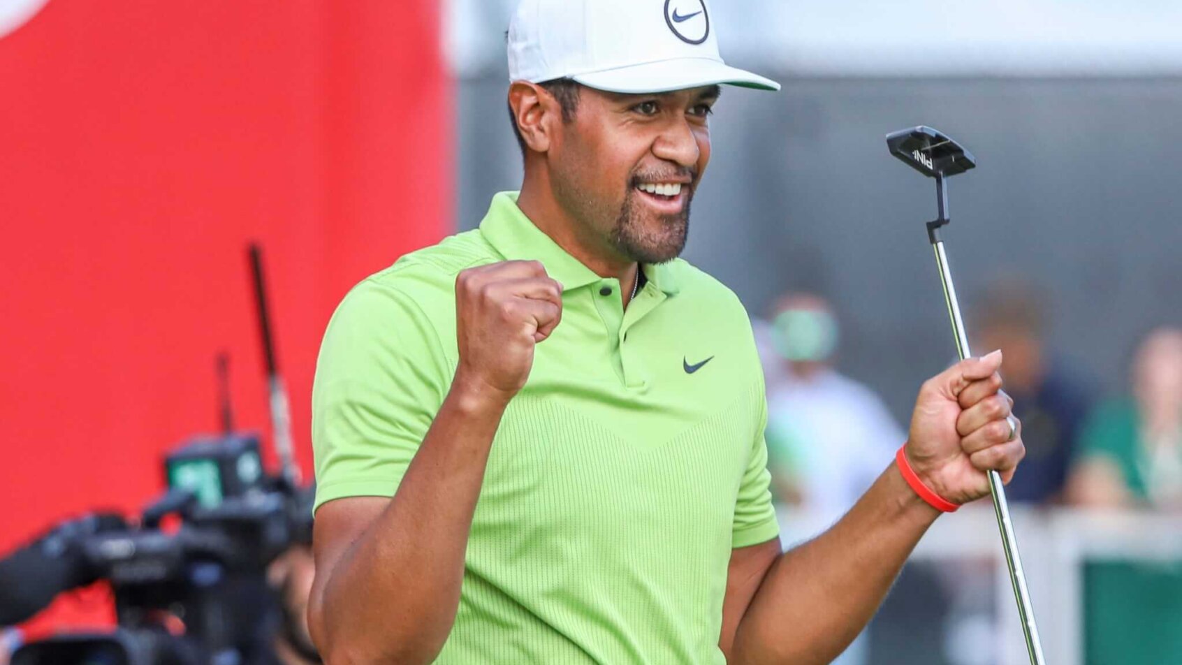 Tony Finau celebrates after winning the Rocket Mortgage Classic