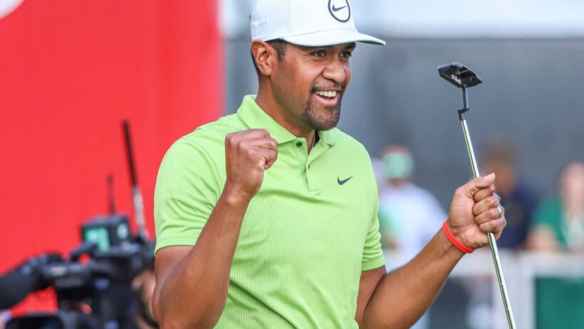 Tony Finau celebrates after winning the Rocket Mortgage Classic