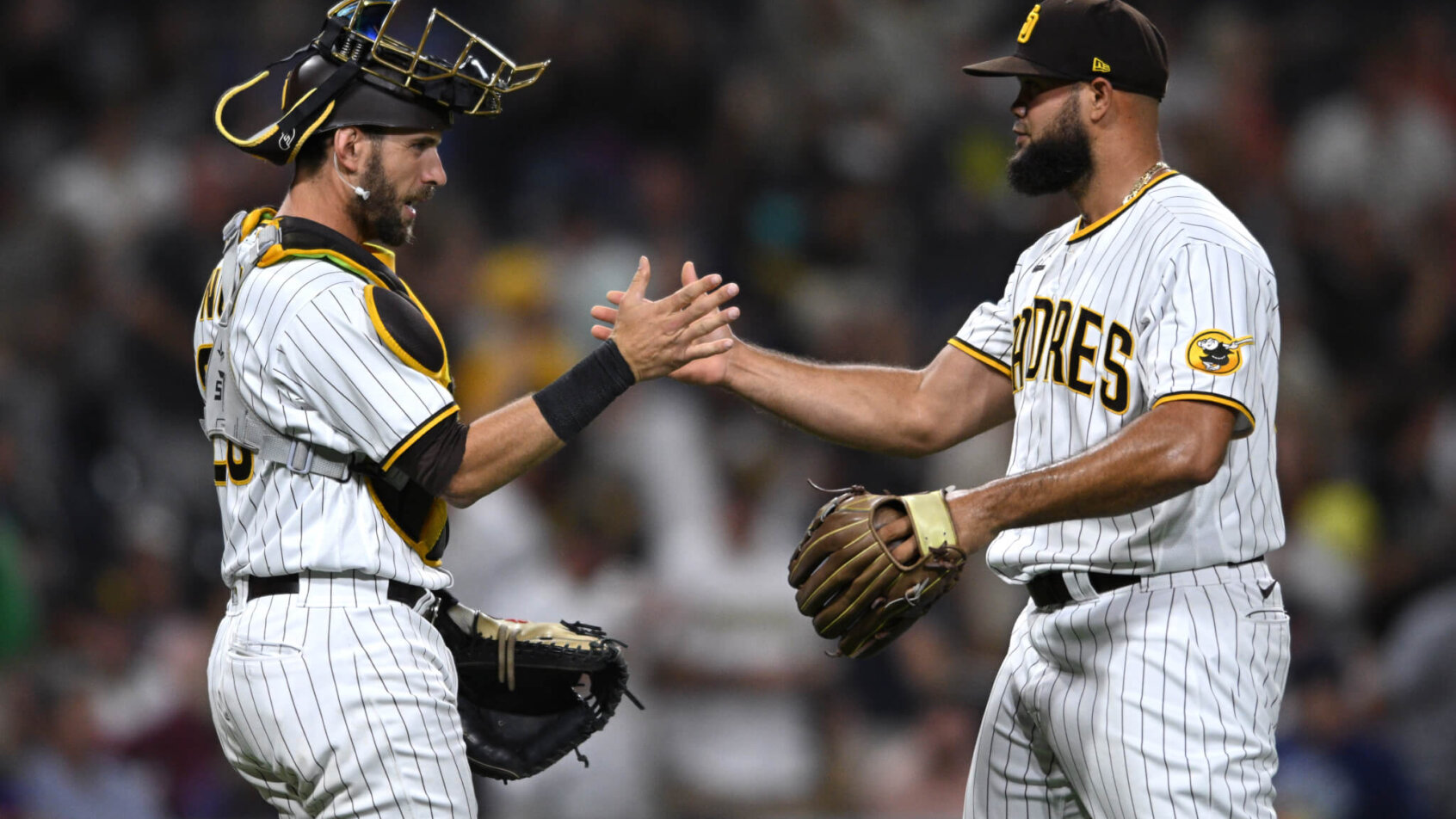 Padres players celebrate after a win.