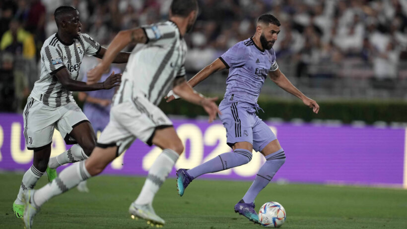 Real Madrid forward Karim Benzema handles the ball against Juventus