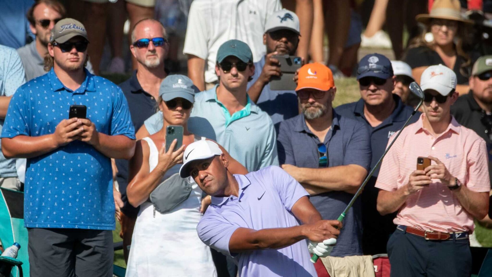 Tony Finau admires a shot around the green