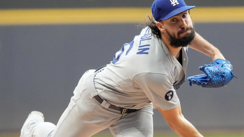 Tony Gonsolin follows through on a pitch