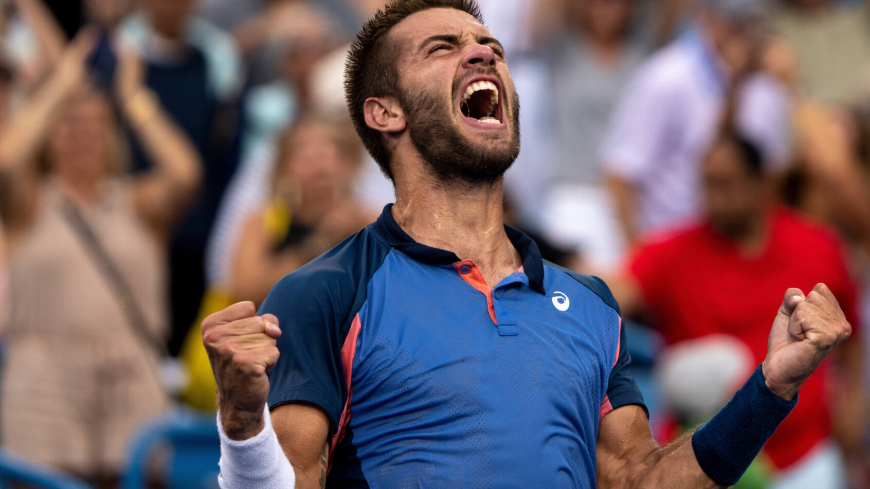 Borna Coric celebrates after winning the Western & Southern Open