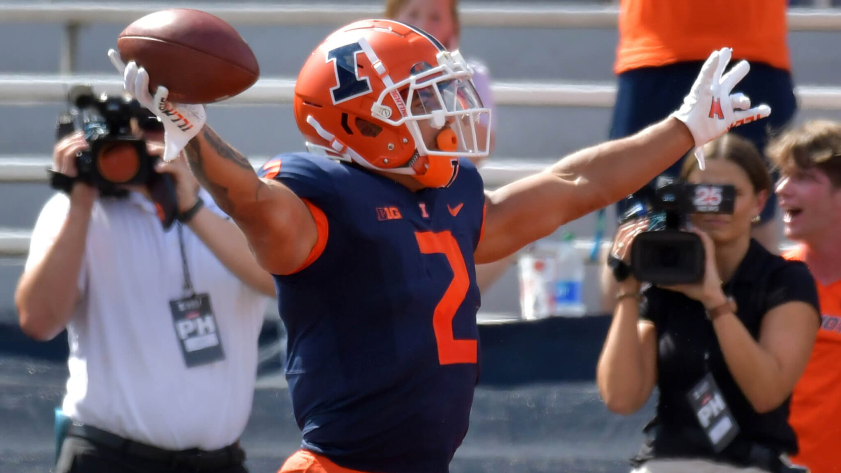Illinois Fighting Illini running back Chase Brown celebrates a TD