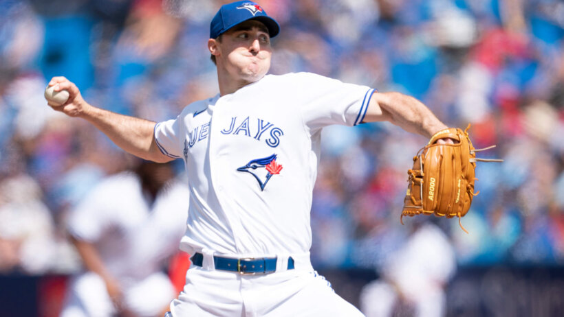 Blue Jays pitcher Ross Stripling throwing a pitch during a game.