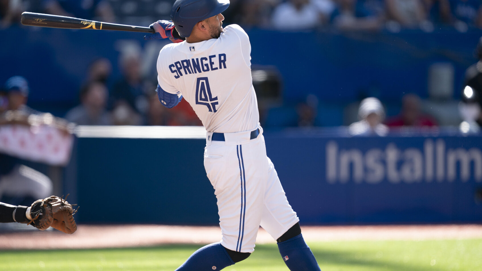 Toronto Blue Jays center fielder George Springer hitting a homer