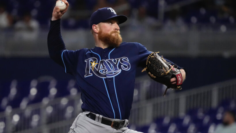 Tampa Bay Rays starting pitcher Drew Rasmussen throwing to home