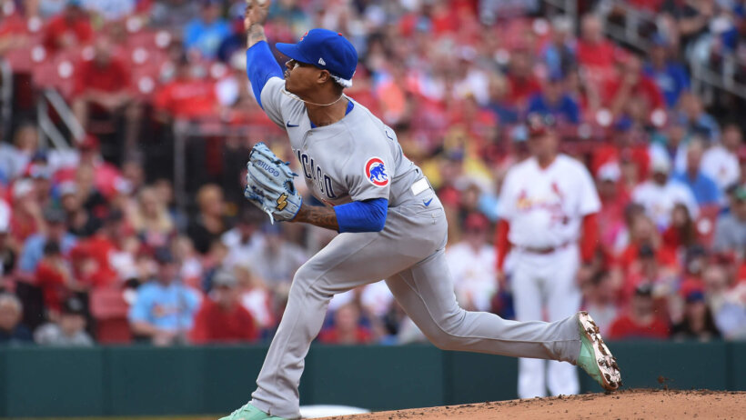 Chicago Cubs starting pitcher Marcus Stroman delivering a pitch to home plate