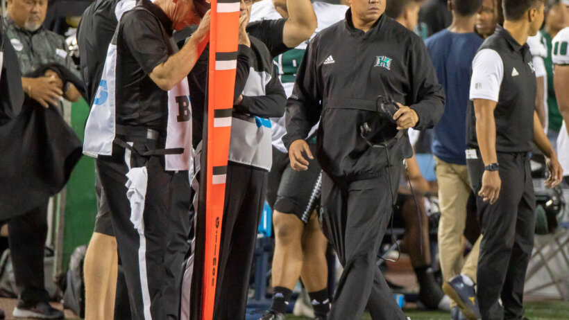 Hawaii Warriors head coach Timmy Chang walks the sidelines
