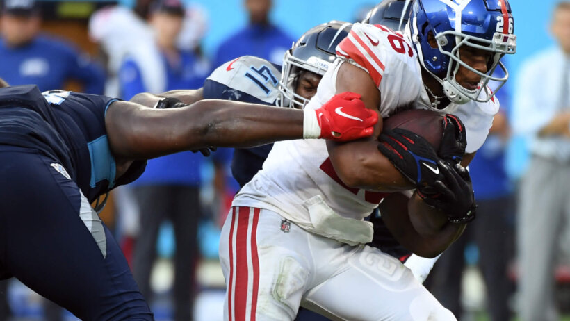 New York Giants running back Saquon Barkley runs during the second half against the Tennessee Titans