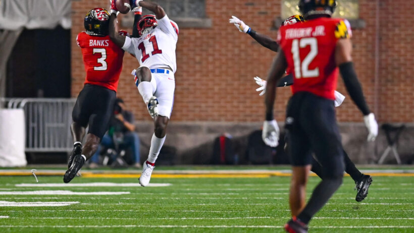 SMU Mustangs wide receiver Rashee Rice catches a pass falling back