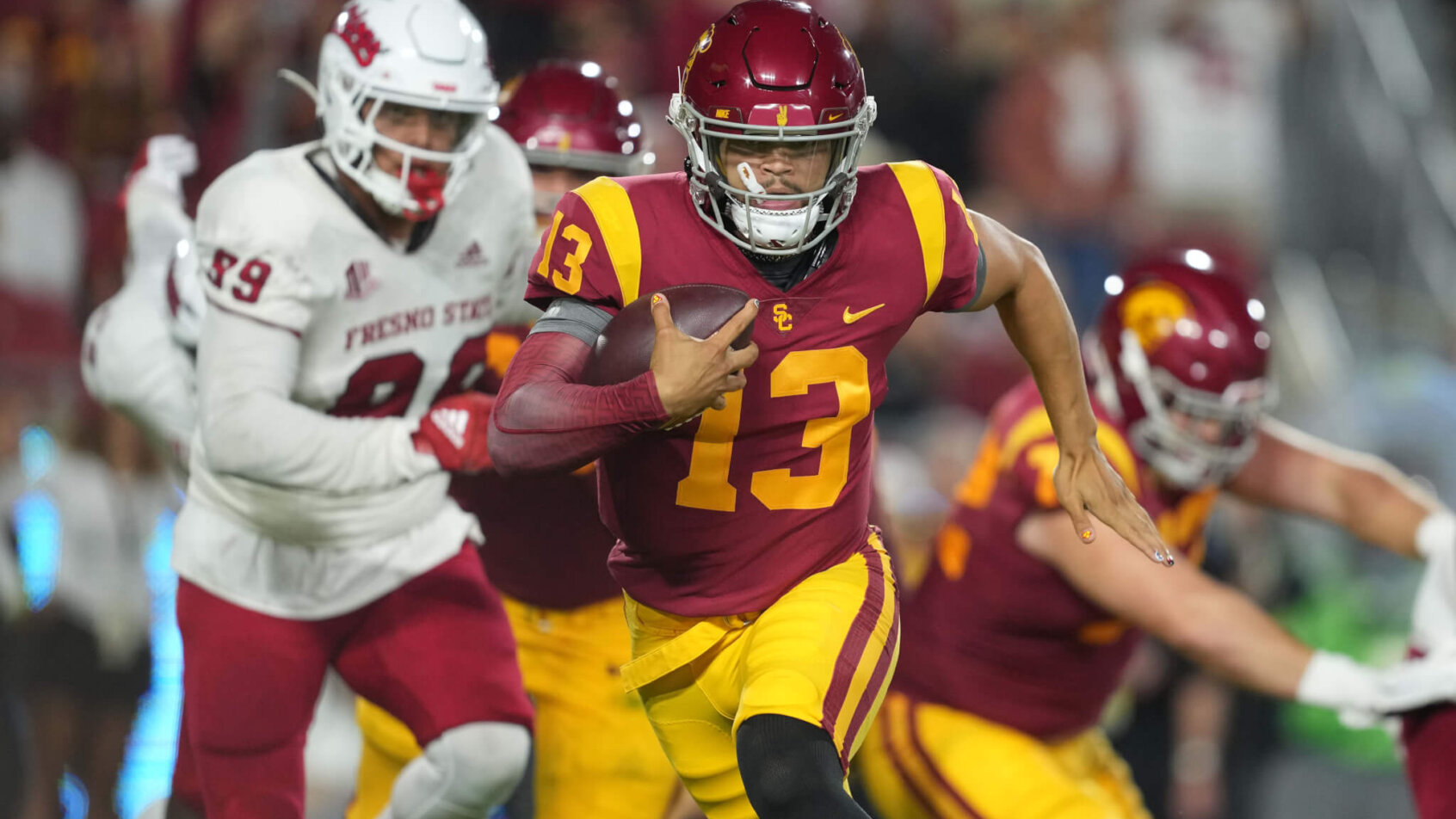 USC Trojans quarterback Caleb Williams carries the ball