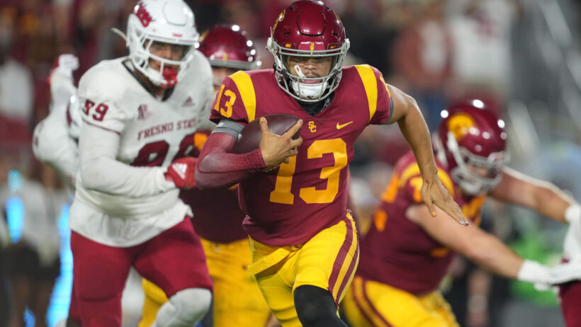 USC Trojans quarterback Caleb Williams carries the ball