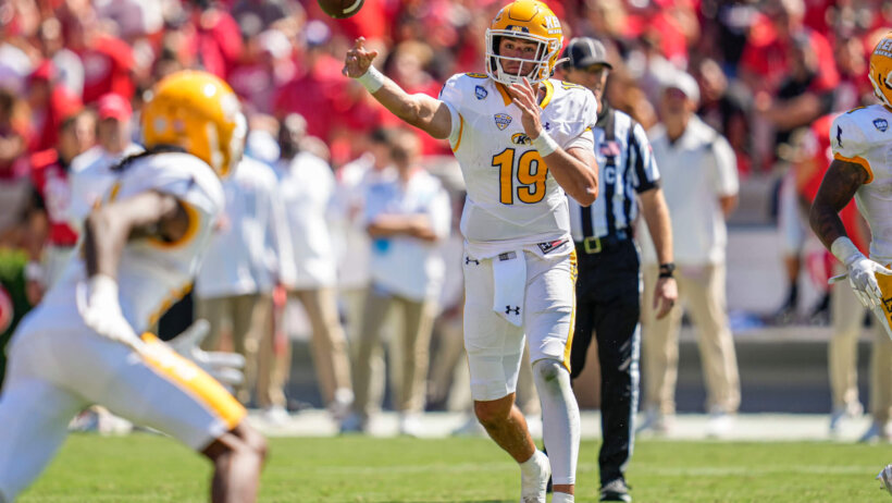 Kent State Golden Flashes quarterback Collin Schlee passes the ball