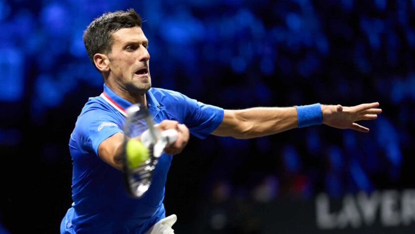 Novak Djokovic lunging for ball