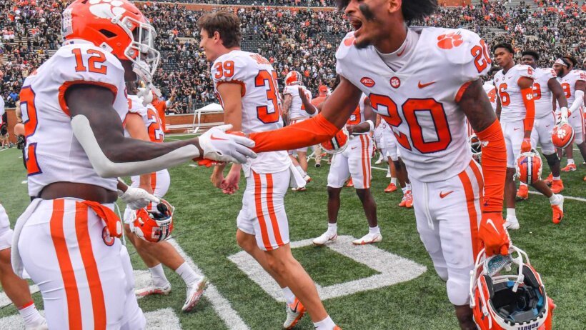 Clemson players celebrate an OT win over Wake Forest
