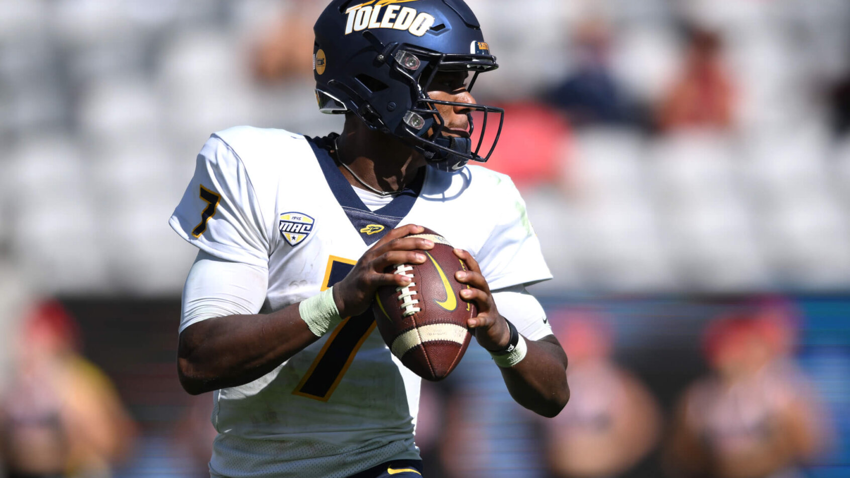Toledo Rockets quarterback Dequan Finn looks to pass
